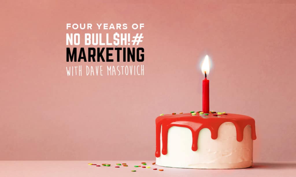 Picture of a cake with a red candle and text that reads "Four Years of No Bullsh!# Marketing." Picture is being used for four-year anniversary episode.